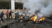 A Palestinian's burning car blown up in Lebanon. (AP Photo/Mohammed Zaatari)