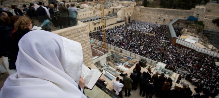 Worshipers pray in front of the Western Wall. (Yonatan Sindel/Flash90)