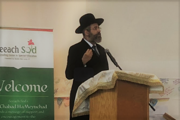 Ashkenazic Chief Rabbi David Lau at Chabad of Poway. (screenshot)