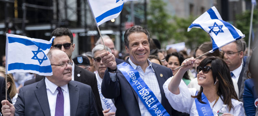 New York Gov. Andrew Cuomo, center, and Consul General of Israel in New York Dani Dayan. (AP Photo/Craig Ruttle)