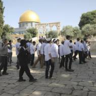 Israeli police escort a group of Jews near  Dome of the Rock /Al Aqsa Mosque on the Temple Mount, June 2, 2019. (AP Mahmoud Illean)