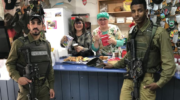 Ginny Nissenbaum and Sharon Katz serve soldiers at Pina Chama (Courtesy)