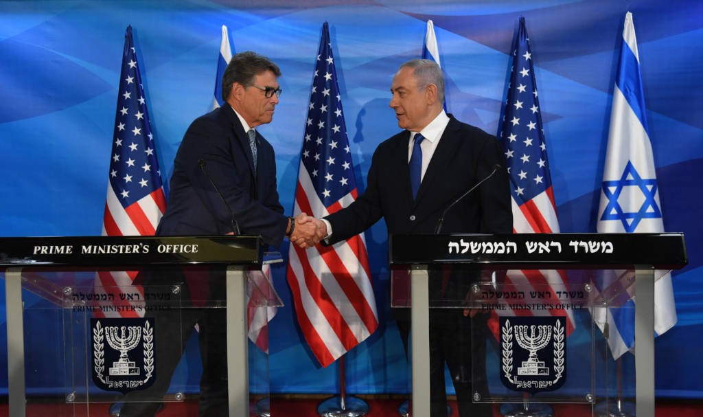 US Energy Secretary Rick Perry, left, shakes hands with Prime Minister Benjamin Netanyahu.