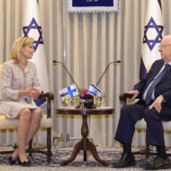 Israel's President Reuven Rivlin (r) meets with Finnish Ambassador Kirsikka Lehto-Asikainen at the President's Residence in Jerusalem.