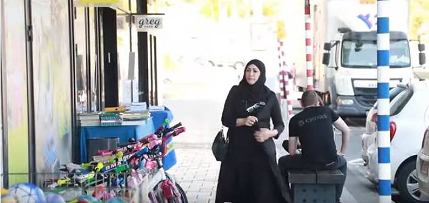 Arab woman in Jewish town in Judea and Samaria