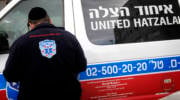 An Orthodox Jewish volunteer of the Emergency Medical Service organization, United Hatzalah, seen near an ambulance in Jerusalem.