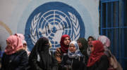 UNRWA staff members outside the UNRWA offices in Gaza City on April 14, 2019.