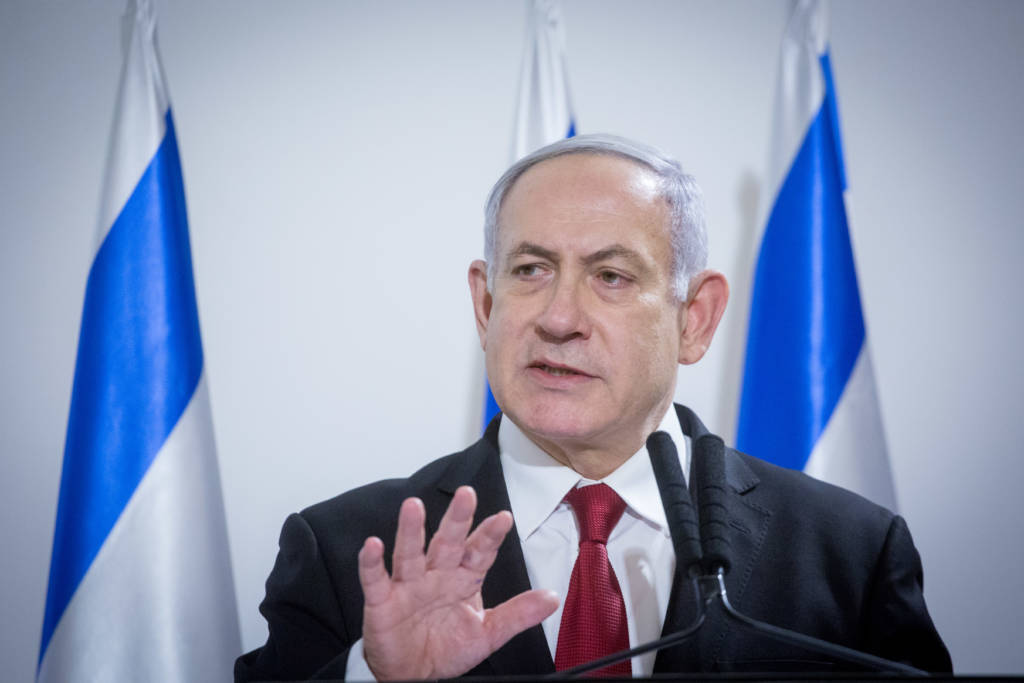 Prime Minister Benjamin Netanyahu delivers a statement to the press after a security cabinet meeting following the escalation of violence with the Gaza Strip, at the defense headquarters in Tel Aviv, on November 12, 2019.