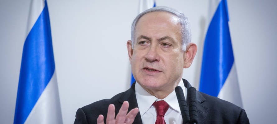Prime Minister Benjamin Netanyahu delivers a statement to the press after a security cabinet meeting following the escalation of violence with the Gaza Strip, at the defense headquarters in Tel Aviv, on November 12, 2019.