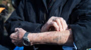 Number on arm of Holocaust survivor (Shutterstock)