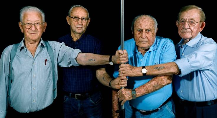 Four survivors from Auschwitz. Samuel (far right) was Adolf Eichmann's prison guard at his trial in Israel.