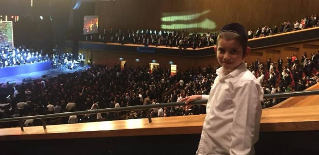 Boy attends Siyum HaShas in Jerusalem, January 1, 2020 (Courtesy)