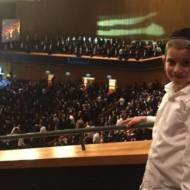 Boy attends Siyum HaShas in Jerusalem, January 1, 2020 (Courtesy)