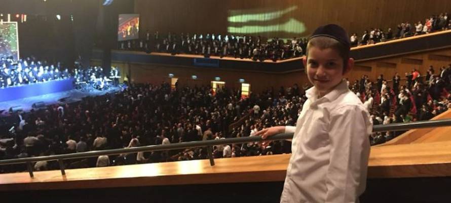 Boy attends Siyum HaShas in Jerusalem, January 1, 2020 (Courtesy)