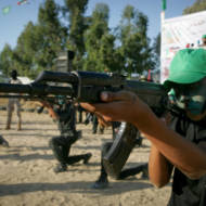 Palestinian child soldier at a Hamas camp.