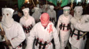 Palestinians in suicide bomber outfits in 2002