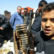 Palestinian child with weapons and ammunition