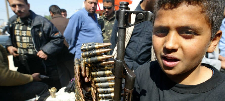 Palestinian child with weapons and ammunition