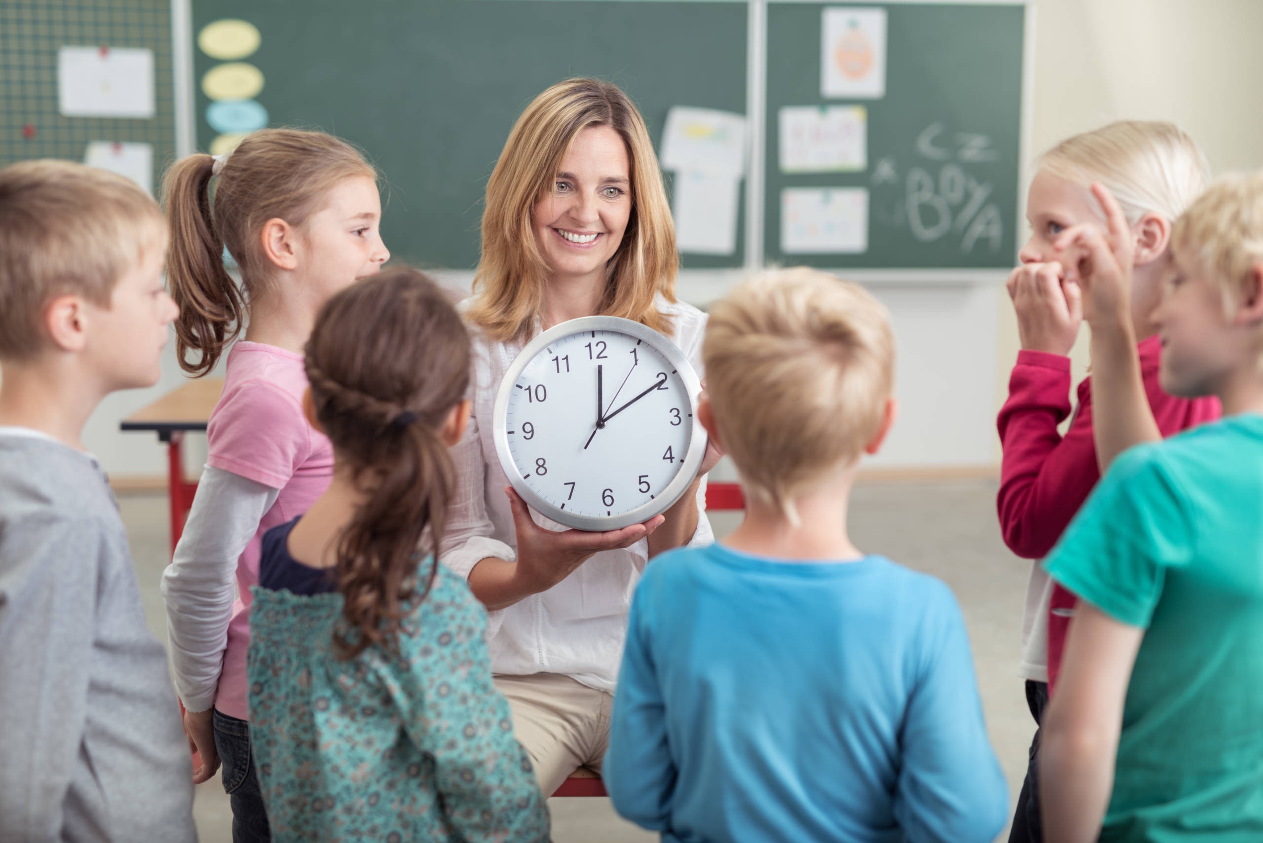 Timing in the classroom. Фото ребенка и учителя Сток. Time Kids фотография. Teaching telling time to Kids. 6. Classtime.