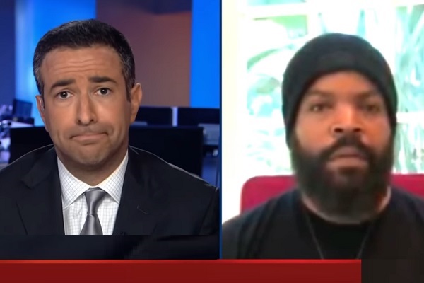 MSNBC's Ari Melber (L) interviews rapper-actor Ice Cube