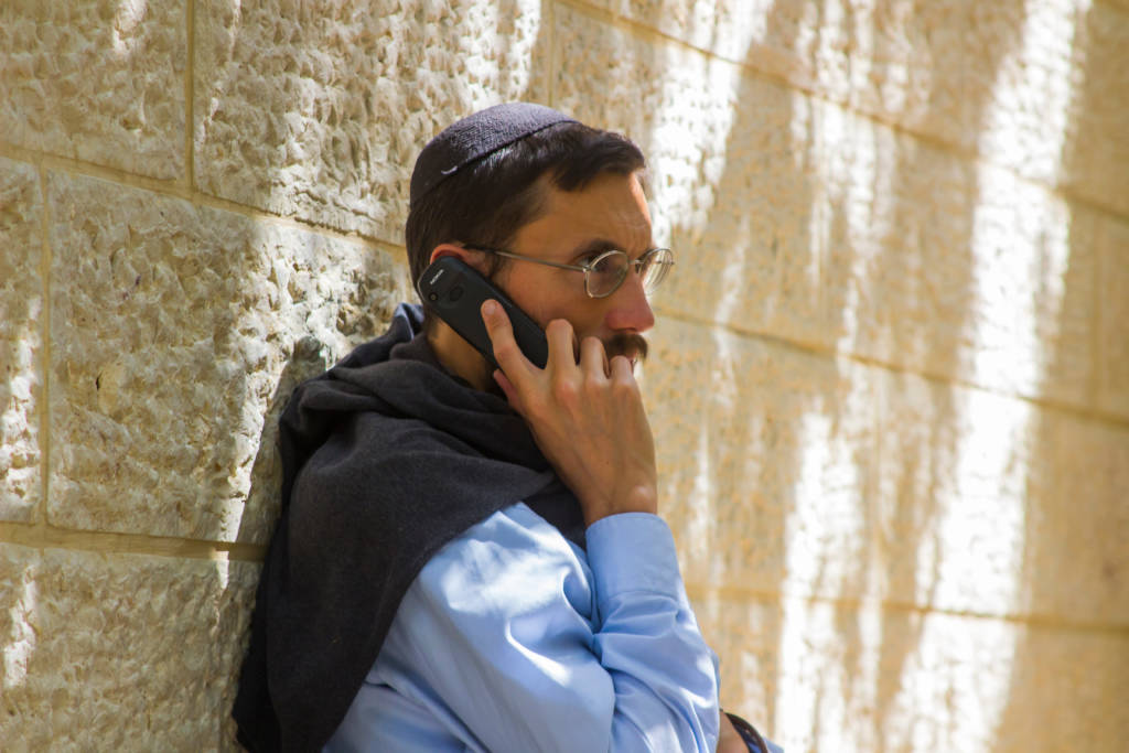 Man on phone in Jerusalem