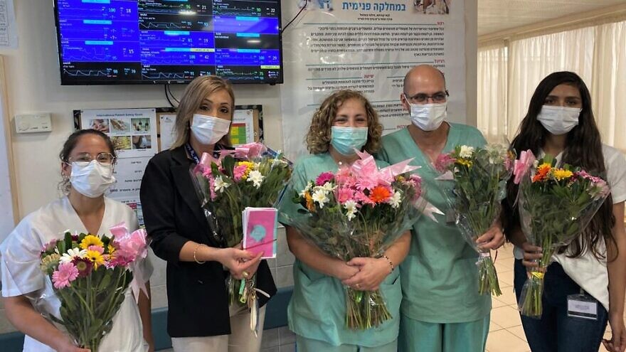 Frontline health-care workers in Israel receive flowers as part of the Shabbat Project 2020.