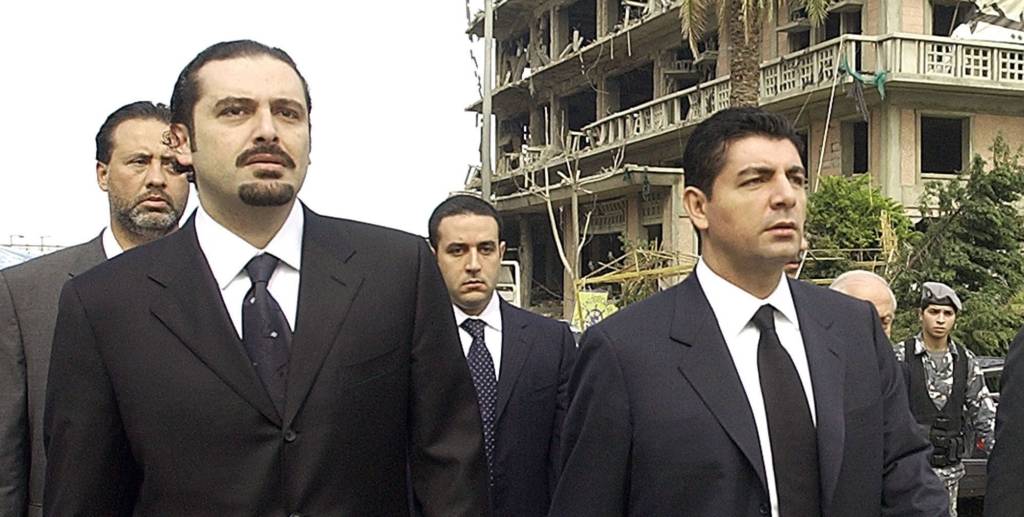 Bahaa Hariri, right, and Saadeddine Hariri, sons of slain Lebanese former Prime Minister Rafik Hariri, visit on Saturday, Feb. 19, 2005 the bombing site in central Beirut where their father and 16 other people were killed in a massive bombing that targeted the former premier's motorcade on Monday.(AP photo / str)