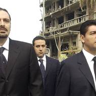 Bahaa Hariri, right, and Saadeddine Hariri, sons of slain Lebanese former Prime Minister Rafik Hariri, visit on Saturday, Feb. 19, 2005 the bombing site in central Beirut where their father and 16 other people were killed in a massive bombing that targeted the former premier's motorcade on Monday.(AP photo / str)