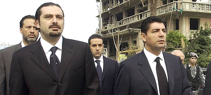 Bahaa Hariri, right, and Saadeddine Hariri, sons of slain Lebanese former Prime Minister Rafik Hariri, visit on Saturday, Feb. 19, 2005 the bombing site in central Beirut where their father and 16 other people were killed in a massive bombing that targeted the former premier's motorcade on Monday.(AP photo / str)