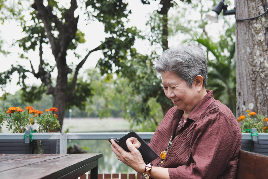 Elderly woman on Smart Phone