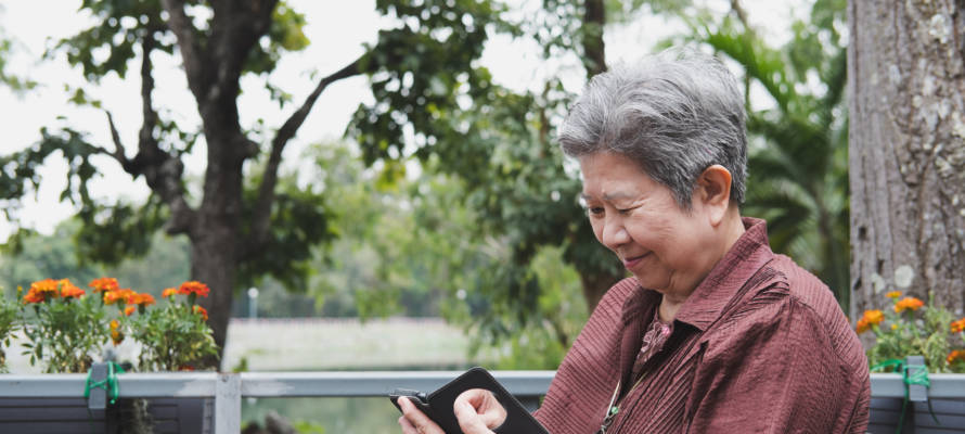 Elderly woman on Smart Phone
