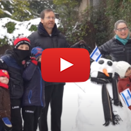 President Herzog and First Lady playing in the snow at the President's Residence in Jerusalem