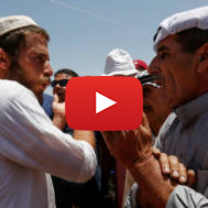 Palestinian argues with an Israeli