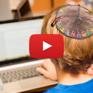 Young,Jewish,Boy,Wearing,Colorful,Hebrew,Yarmulke,From,The,Back