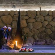 Stanisław Aronson seated at right during the ceremony at Yad Vashem