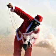 Palestinian Santa attacks Israelis with a slingshot