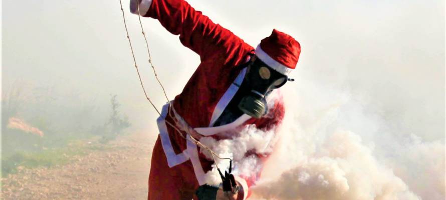 Palestinian Santa attacks Israelis with a slingshot