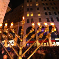 A public candle lighting ceremony in Jerusalem on the last night of Chanukah