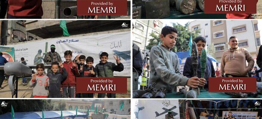 Boys pose with weapons at the Hamas arms exhibition