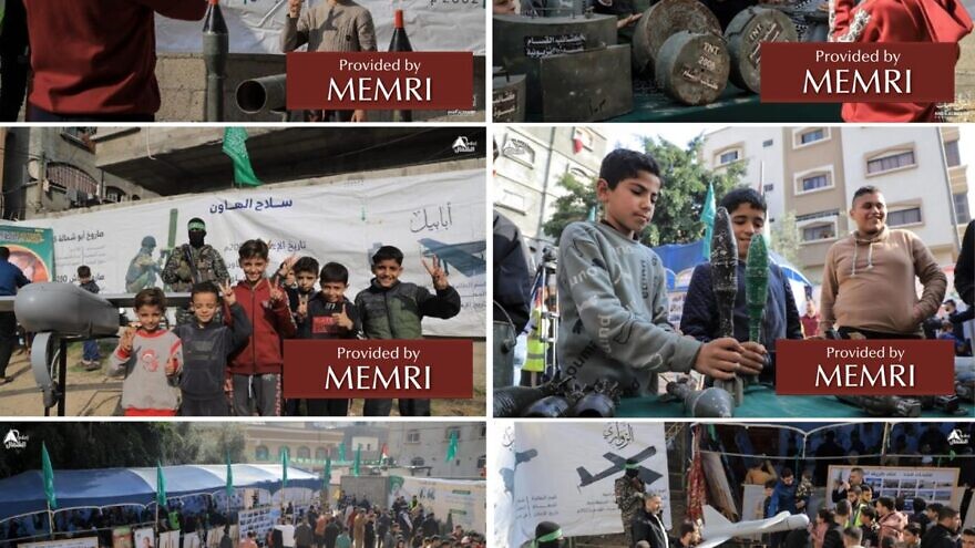 Boys pose with weapons at the Hamas arms exhibition