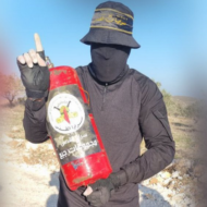 Palestinian Islamic Jihad member with a fire extinguisher rigged as an IED