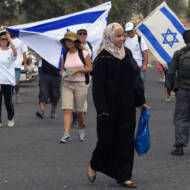 A Palestinian woman in Jerusalem during Sukkot