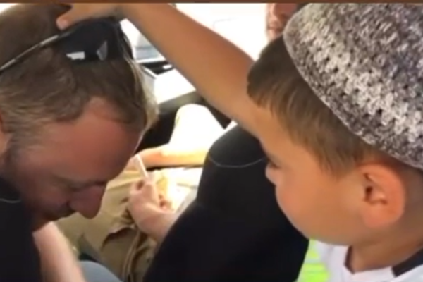 Israeli child blessing IDF soldier