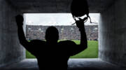 Football Player running out of the Stadium Tunnel