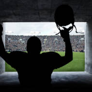 Football Player running out of the Stadium Tunnel