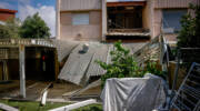 damaged house Acre