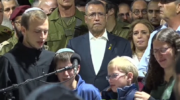 children of fallen soldier Rabbi Avraham Goldberg saying Kaddish (X screenshot)