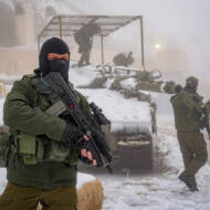 Israeli soldiers patrol on Mount Hermon