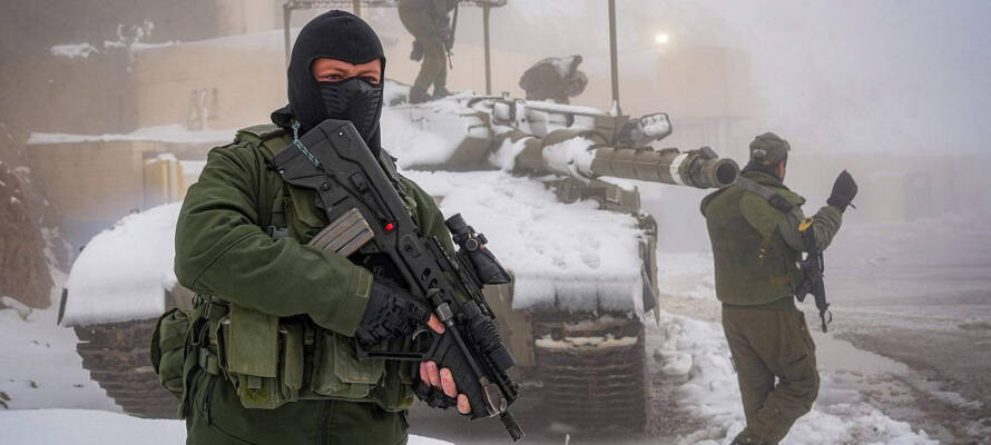 Israeli soldiers patrol on Mount Hermon