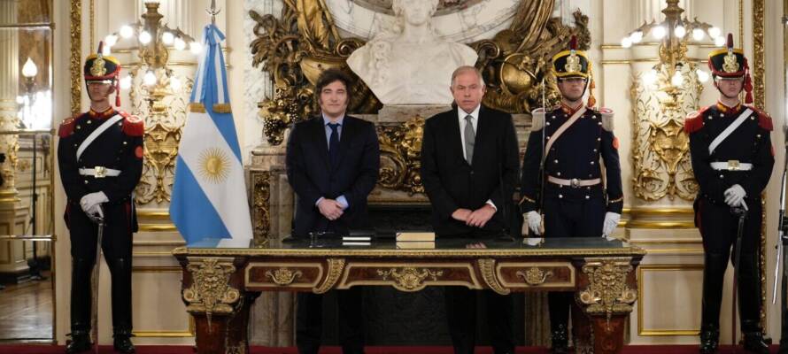 Milei, left, and Gerardo Werthein attend his inauguration as foreign minister in Buenos Aires